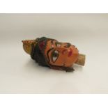 An Indian painted wooden carved puppet head