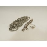 A silver long chain, silver ring etc.