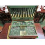 An Atkins brothers silver plated 12 place setting oak cased canteen of cutlery