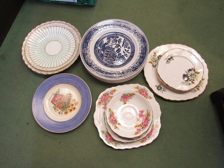 A box containing assorted china including Coalport plates, Old Willow pattern plates etc.