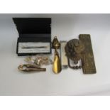 A small collection to include Parker pen, brass lion knocker, leg form nutcracker etc.