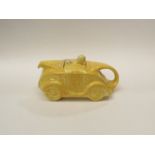 A Sadler yellow racing car teapot