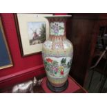A large Chinese vase, hand painted floral design and figures, 62cm high including wooden stand