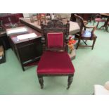 A late Victorian carved oak chair with Grecian bowl and acanthus leaf decoration the turned fore