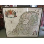 A large embroidery depicting the Netherlands, framed and glazed, 120cm x 138cm