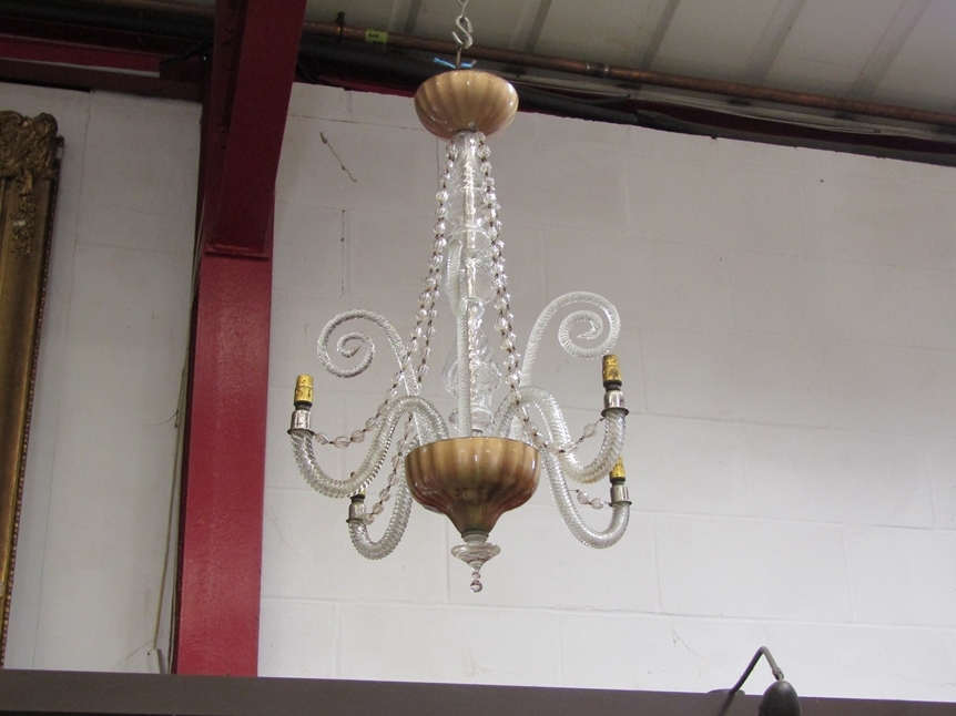 A four branch twisted glass chandelier