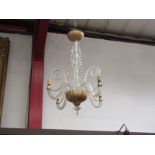 A four branch twisted glass chandelier