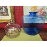 A modern art glass onion shape vase with applied swirls, together with a blue glass vase (2)