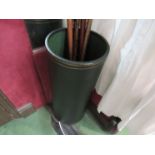 A green leather cylindrical stick stand with gilt leaf decoration and internal drip tray. 60cm high