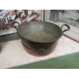 Two copper twin handle pans, one marked Burlington, monogrammed B.H.F