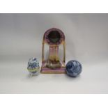 An early 20th Century Art Nouveau timepiece, blue and white carpet bowl and egg form ring box (3)