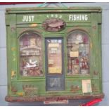 A wall hanging shop display "Just Fishing", 49cm x 59cm