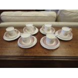 A set of six Susie Cooper coffee cups, saucers and side plates, a/f