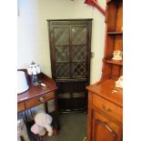 An oak Old Charm astragal glazed front corner cabinet, 167cm high x 67cm wide