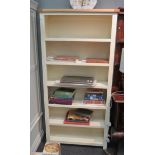 A modern tall bookcase with light oak top six shelves, 180cm x 89cm x 30cm