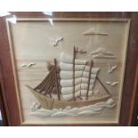A picture of a sailing ship constructed from wood. Framed and glazed. 45.5cm x 45.5cm