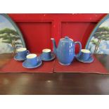 A Moorcroft blue part coffee set consisting of coffee pot, three cups and fine dishes