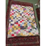 A mid 20th Century patchwork quilt (single)