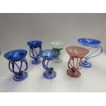 Six art glass dishes, smallest 12cm, largest 16cm tall