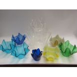 Seven glass and three perspex handkerchief vases, most 10.5cm tall