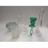 Four pieces of glassware to include candle holders