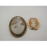 A cameo brooch of a maiden in gold mount and another in yellow metal frame