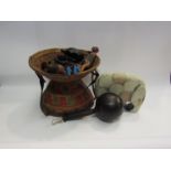 An ethnic basket containing related items to include carved figures together with a carved soapstone