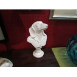 An anthropomorphic bust of a dachshund wearing a jacket, 16cm tall