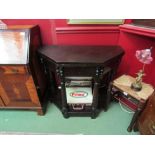 An 18th Century fruitwood credence table the fold over canted top on turned legs joined by a pot