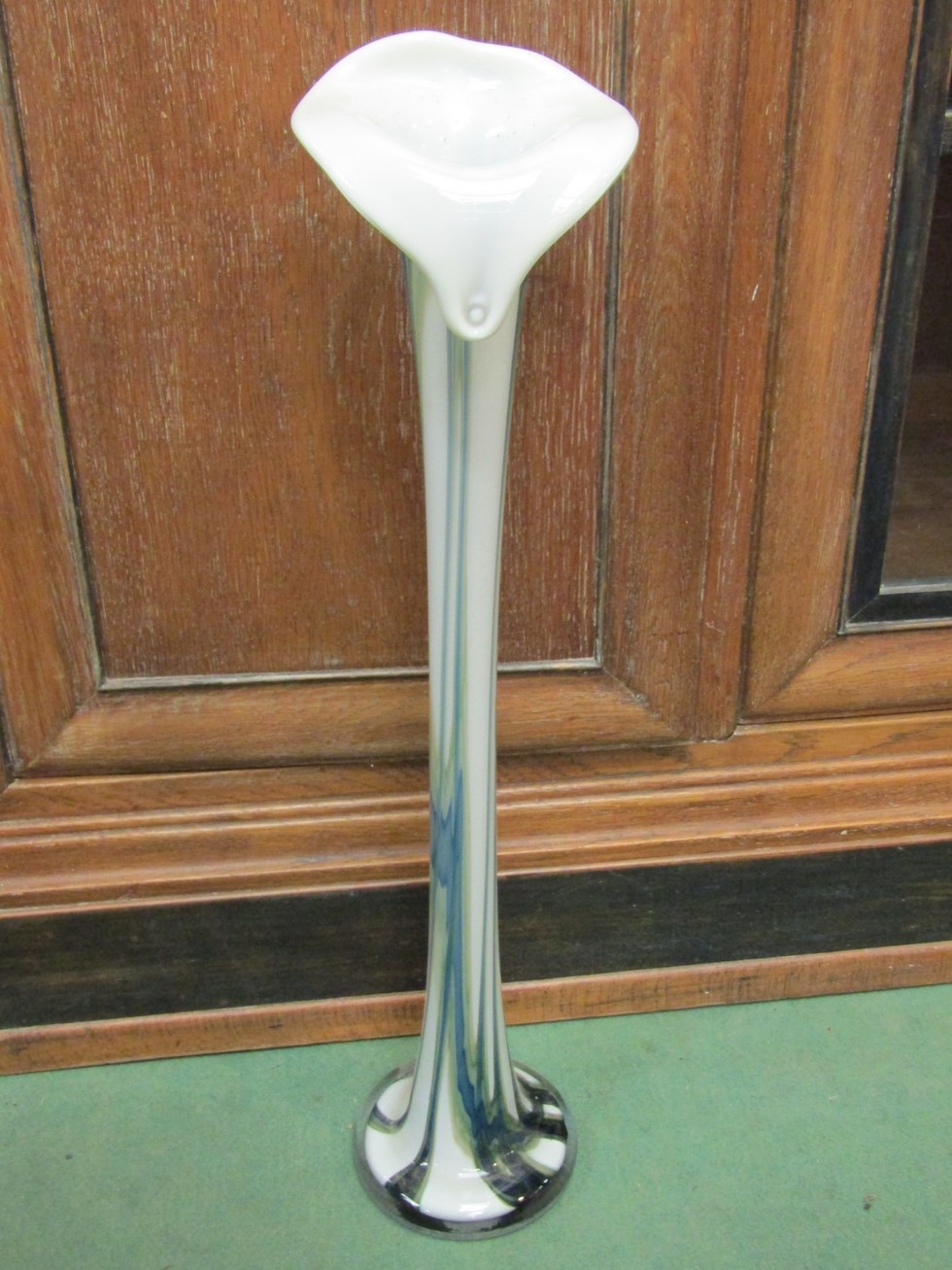 A tall art glass slender floral vase, 63cm tall