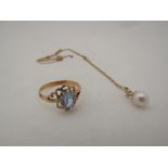 A costume ring set with pale blue stone and a single pearl pendant hung on chain, stamped 9ct