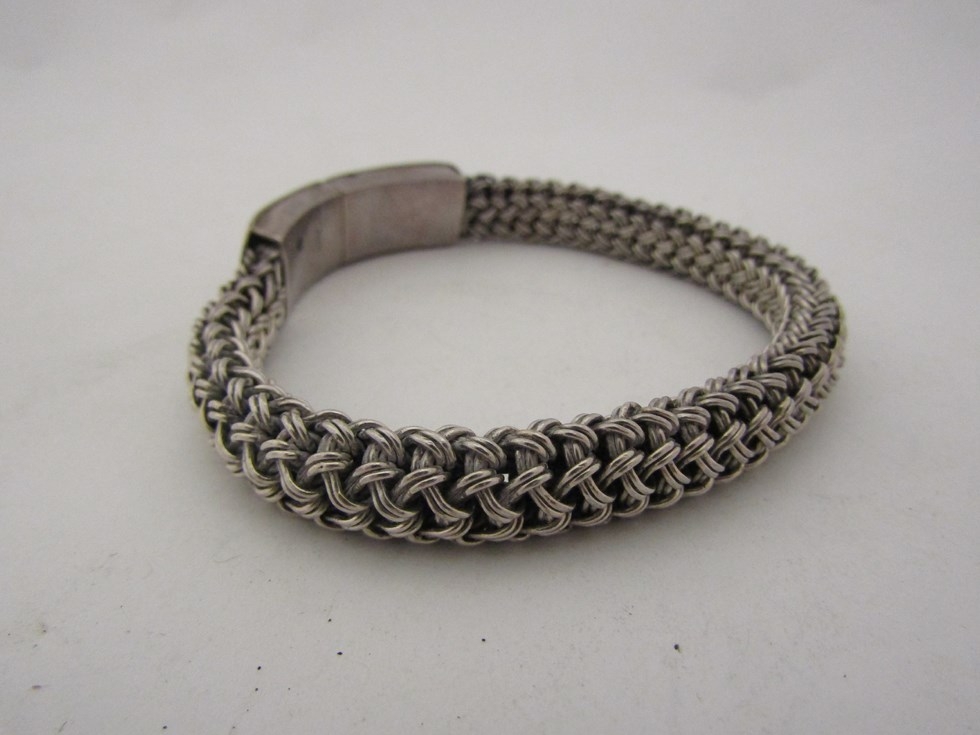 A "woven" effect bracelet stamped 925