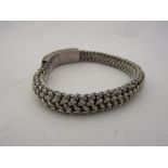 A "woven" effect bracelet stamped 925