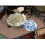 An 18th Century Chinese blue and white plate and 19th Century jardiniere, both damaged, 28cm and