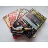 A Burago Williams FW14 1/24 scale F1 car and a quantity of 1980's Grand Prix programmes