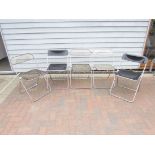 A group of three 'Plia' chairs and two of similar design in clear, smoked and black perspex,