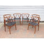 A Set of six Danisk teak 'Wishbone Chairs designed by Henning Kjaernulf for Bruno Hansen c1963