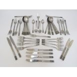 Approximately 51 pieces of stainless steel cutlery c1960's, scroll design