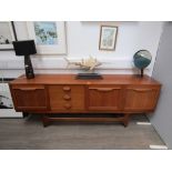 A Stonehill mid 20th Century teak sidecabinet, 'Stateroom' range. 197.5cm x 45cm x 73cm high