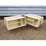 A pair of Ernest Race designed Penguin Donkey bookcases, repainted in cream. Each measures 53.5cm