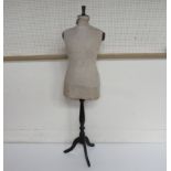 A linen clad female tailor's dummy, some staining