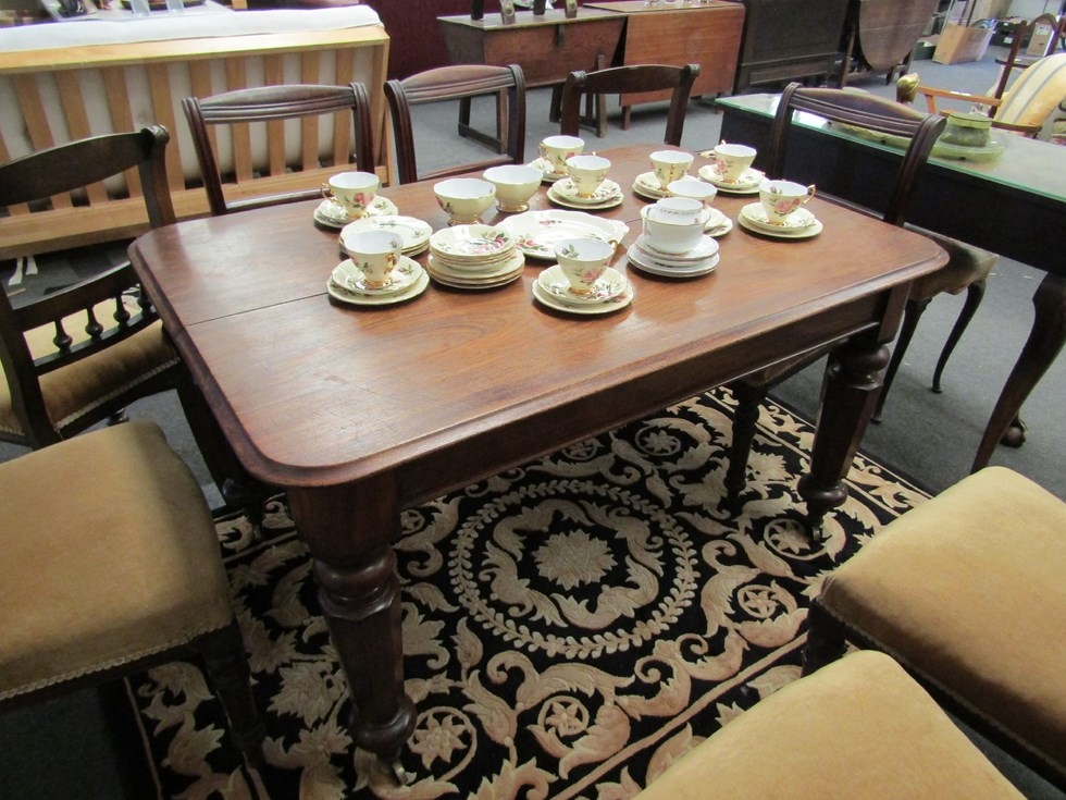 A Victorian mahogany extending dining table on canted legs to castors, no extra leaf