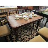 A Victorian mahogany extending dining table on canted legs to castors, no extra leaf