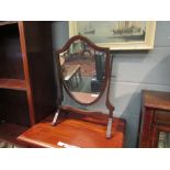 An early 20th Century shield shape dressing table mirror