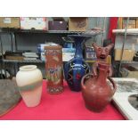 A studio pottery vase with a central raku glazed band, an unusual ceramic bottle vase with figure
