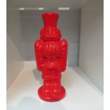 A novelty red soldier ceramic money box, 26cm tall