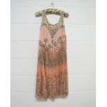 A 1920's wonderful chiffon peach silk two tone evening dress decorated with pearlised beads, chiffon