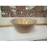 A Thomas Plant ceramic mixing bowl and another