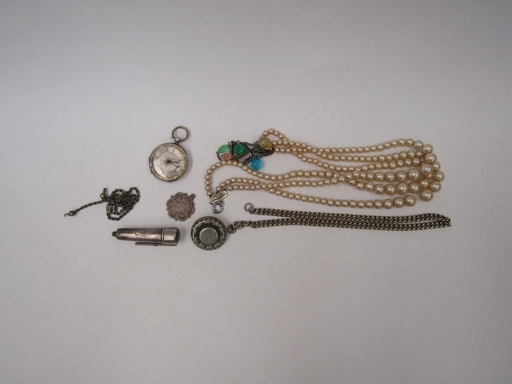 A silver cheroot holder, pocket watch, faux pearl necklace, silver albert etc