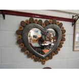 A heart shaped wall mirror with wood & pressed metal frame, 74cm x 80cm